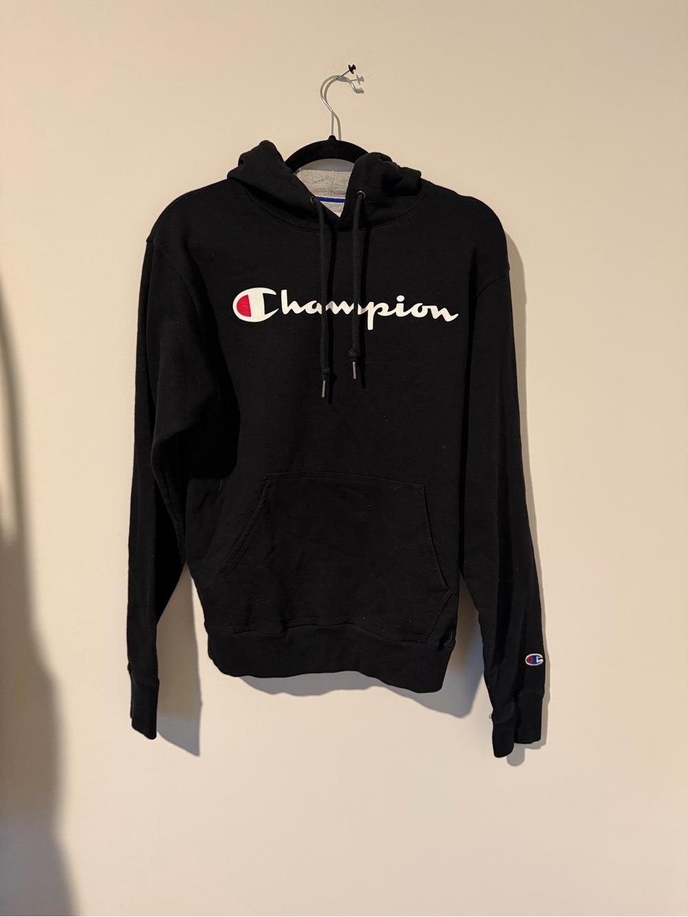 Champion Black Hoodie with White Script and Red Accent